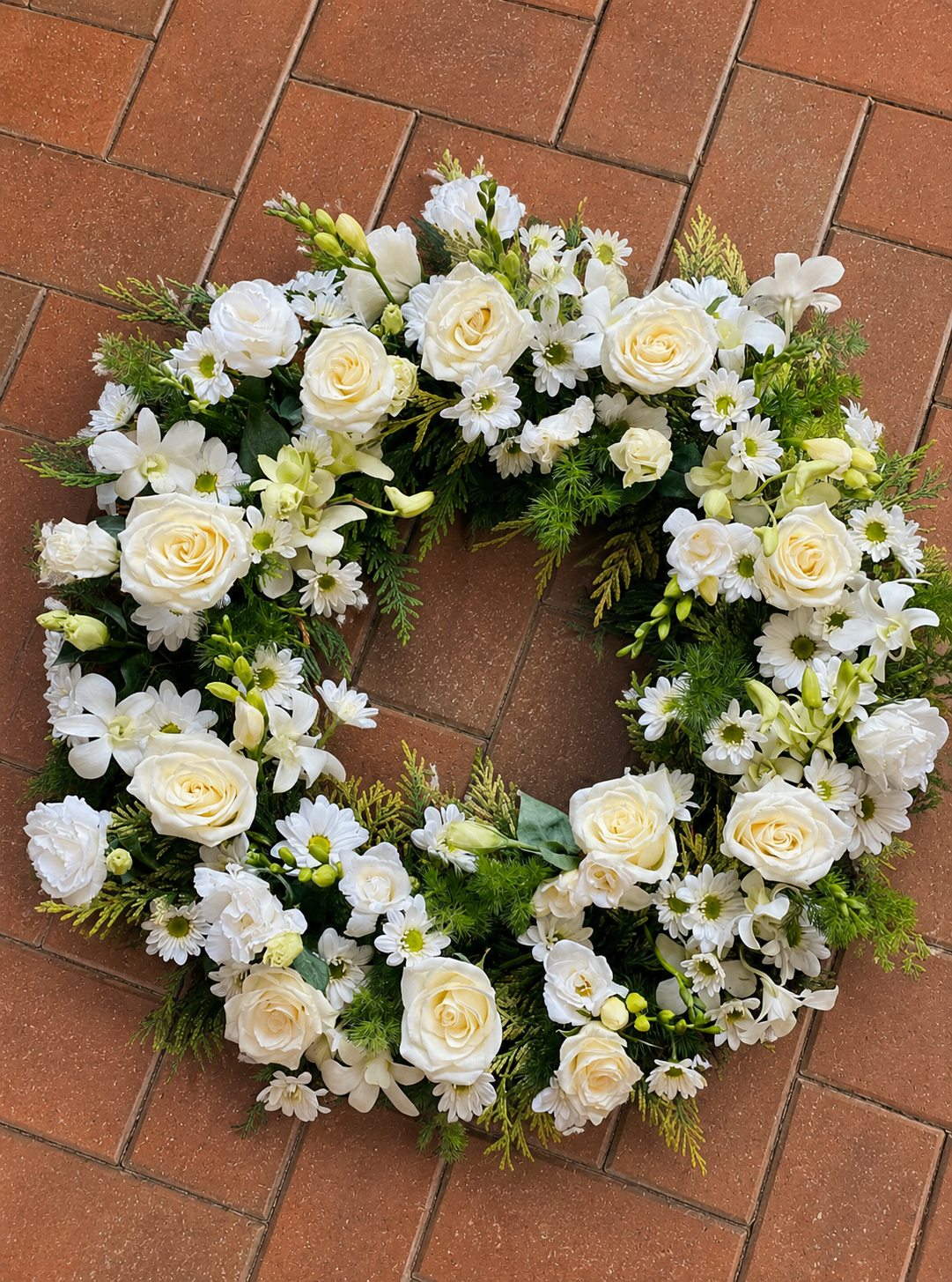 Seasonal White Sympathy Wreath